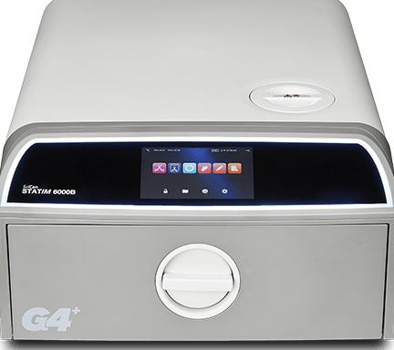 Scican G4 device with a touchscreen panel and a circular drawer.